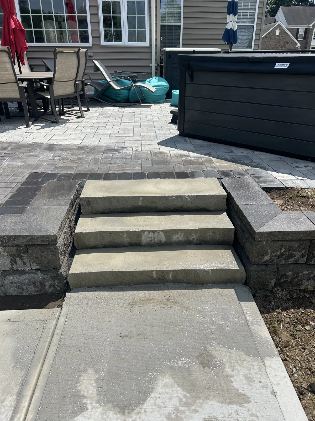 Paver steps between block cheek walls