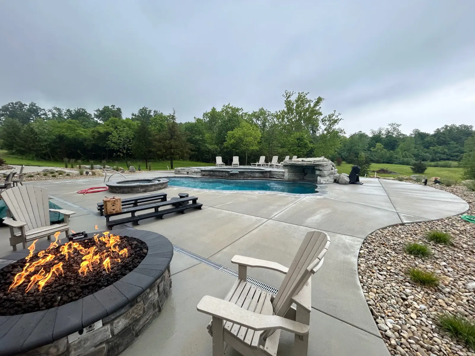 Backyard pool with natural stone grotto and waterfall
